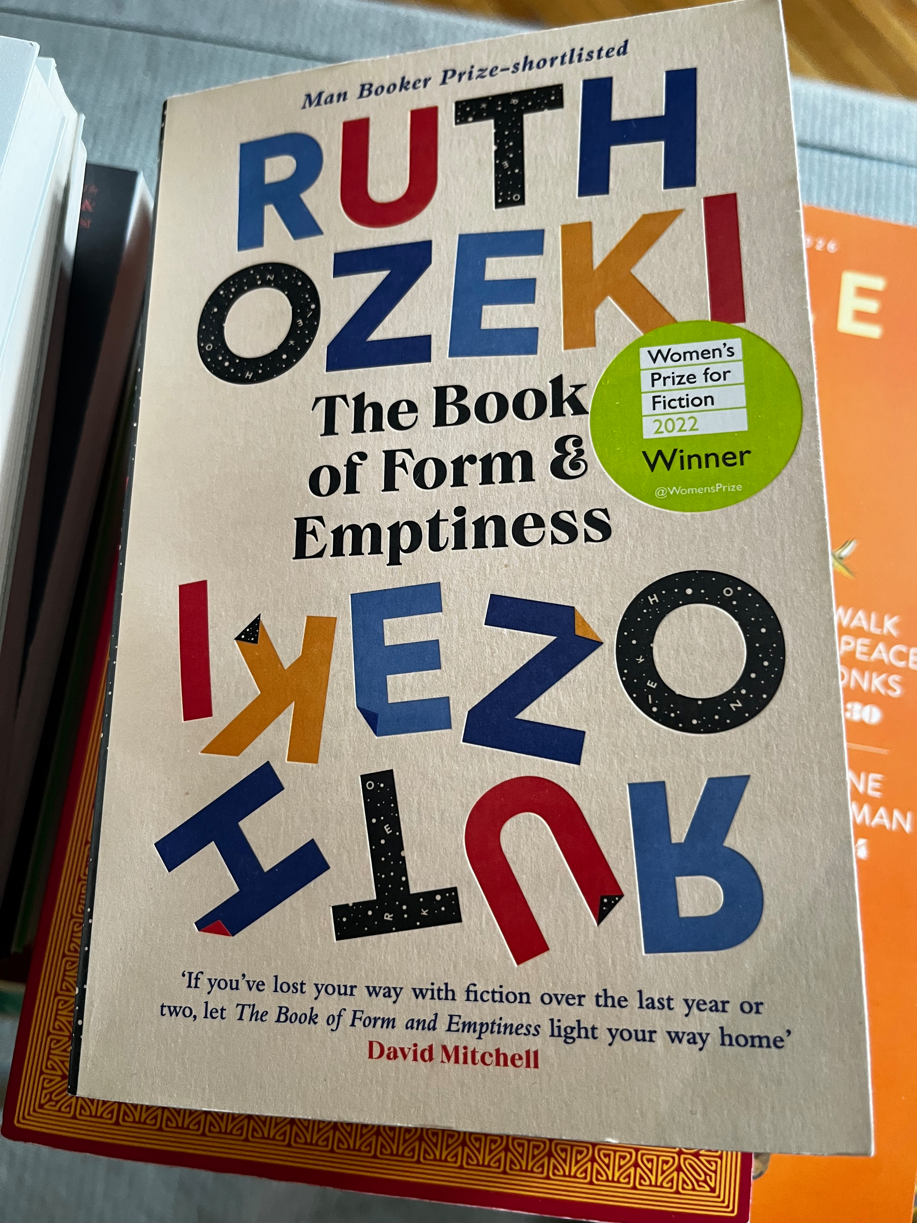Auto-generated description: A copy of Ruth Ozeki's book The Book of Form & Emptiness with a green sticker indicating it won the Women's Prize for Fiction 2022 is shown.